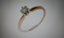 New S/1 color J-L Diamond ring never been worn.&nbsp; Round brilliant size ten.