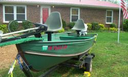 14 ft aluminum boat with 10 hp johnson and trolling motor in great shape with new trailer---call larry at
615 962 0533 asking $1150.00 and it is worth every penny might take a little less