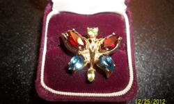CUSTOM MADE
14KT YELLOW GOLD
DOUBLE BAIL IN BACK FOR SLIDE
GARNETS , BLUE TOPAZ, PERIDOT
BEAUTIFUL !
CASH ONLY
SALE FINAL