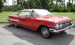 1960 Chevy Impala 2dr/ht,ext.red/white,int.red/white houndstooth,350ci v8,350 turbo trans,edelbrock 4 barrel carb,edelbrock alumimun intake manifold,electronic ignition,605 power steering box,308 rear end,daul exhaust,electric fans,power brakes,vintage