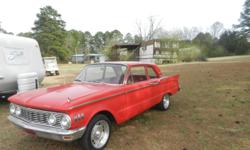 1961 Mercury Comet , 2dr. Red, in very good condition and runs good. You may call 706-401-8240, 8am - 8pm