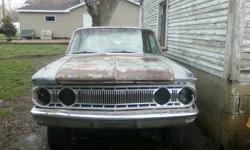 62 comet custom 2 door sedan project.no motor or tranny.all good glass.all but one piece of trim is there.9 inch rear end.very solid car.its about 90% complete. its a pretty rare car I have only seen 2 in my whole life. well worth what I'm asking.tittle