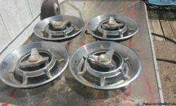 This is a set of matching 1964 oringinal hubcaps for a &nbsp;Dodge Challenger. &nbsp;I'm not sure if they are after market but I do know they came off the car in 1979 when he got the car&nbsp;The only reason he took them off was because he was 15 and this