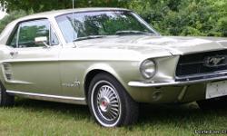 This is a restored 1967 Mustang 2 door hardtop with new original color paint (Sautern Gold). Car was originally no power brakes or power steering. Both have been added in the last year using all FORD parts. Automatic in the floor. Engine is a 200 CI six