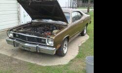 Hi I have a 1975 Plymouth Duster , 318 eng. , auto Trans. , edlebrock intake and carb. ,headers , and mild cam .. A little rusty with bad interior.. But solid car!! Needs a little TLC , I am asking $4,800 but would consider bartering... If interested or