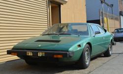 This 1976 Ferrari 308GT4 is an extremely original one owner car with just 35k miles from new. It wears one of the most desirable and rare color combinations you'll find on a 308GT4; Verde Pino Metallizzato with tan leather. It also comes accompanied by