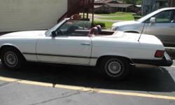 1982 MB 380 SL Convertible, V8; white exterior with milk chocolate interior; automatic, approx 16K miles; no body damage, interior needs cosmetic work. Hard top in good shape - soft top needs to be replaced. Located in Belleville, IL; recently transported