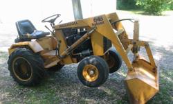 Very Clean Original Paint 648 18 hp Twin Onan engine. Runs Great! Loader Works Great as well! High and Low Range. Hydraulic Drive and Lift. With Hydraulic Power Steering. Good Tires. Comes with rear weight box, Rear wheel weights as shown in pics. Note I