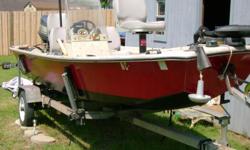 This is a shallow draft boat with a 50 Hp Yamaha 4 Cyl, and a 70# Minn Kota Bow Mount foot control. Runs great and has right console with steering wheel and compass and Depth Finder Eagle. The motor has electric trim & tilt Runs so good almost whole