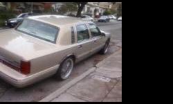 Creme colored 4-door towncar, runs really good. Low original miles of 51130, leather seats, interior is off white, vogue tires, cassette radio, needs tags and smog. Must see to appreciate. Contact Ms. Davis at 510 472-0222 if interested