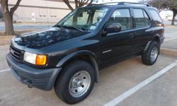 This 1998 Isuzu Rodeo is one of the most fuel efficient suv's you can buy thanks to its smooth 4-cylider engine and 5-speed manual transmission. With only 106K miles this suv is sure to provide you and your family with years of reliable service. Don't