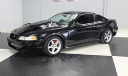 Stk#150 1999 Ford Mustang
This Mustang is painted Black BC/CC with a Fiberglass Cowl Induction Hood, Eibach springs, dual outside mirrors, Cobra rims with Kumho tires that are like new. Kumho Street Slicks tires on rear. Dual exhaust with chrome tips,