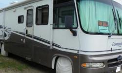 2001 Triple-E Commander 35ft Class-A Motorhome, V-10 Gas, two slides, 2 ACs, 2 TVs, sofa pull out bed, washer/dryer, tow package, convection/ microwave, awnings over slides, central vac, Onan generator 5500 watts, safe T-plus steering, backup camera,