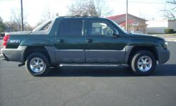 This is a 2002 Chevy Avalanche Z71 4x4. The exterior is dark green with no dents or dings. Paint is in great condition. It has 17in. Chrome Chip Foose wheels on Michelin tires with 85% tread. It comes with a tow package and bed liner. The interior is