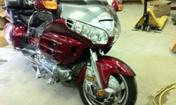 Well taken care of Sharp looking 2003 Honda Goldwing GL1800 for sale, low miles 51,000 comes complete with all options available including custom lighting. Maroon in color. MOTIVATED SELLER Looking to sell for $12000.00 has clear title and ready for a new