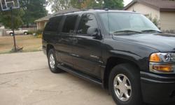 Full size V8 6.2L GMC Yukon Denali- Charcoal Grey beige leather interior, has power everything; mirrors, seats, locks. 4 captain chairs all with individual seat heater with a 3rd row. Sunroof, DVD system, navigation, satelite radio, 6 cd changer, boss