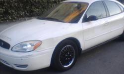 Hi your looking at a 2005 ford taurus this Car is well taken care of &nbsp;85.000 miles NO ENGINE LIGHT ON interior some dings but this car is in good condition ready to go!!! AC AND RADIO ARE WORKING SO&nbsp;Make your call now&nbsp;clean title so If you