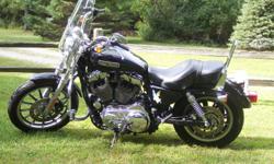 Black and Chrome, sissy bar, new cover, windshield, jack, 5200 miles, Superb condition,,,etc.