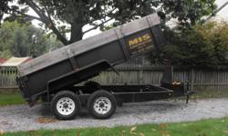 Has two way tail gate / ramps / tarp system / 10,000 gvw. Call --