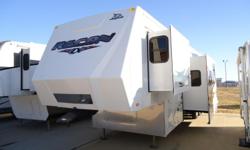 2008 Recon 37U ZX toy hauler fifth wheel RV by Jayco. Non smoker no pet smells. As nice as can possibly be with: triple slide, queen bed slide, 2 AC?s, stackable washer dryer, Onan 5500 generator, Xantrex power inverter system, 46? Toshiba flat screen,