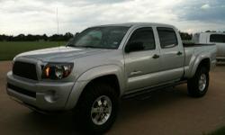 2009 Toyota Tacoma Double Cab SR5 TRD Super Charged 4x4 with only 26,000 miles.It sports the powerful TRD Super Charger with TRD Ram Air/Cold Air Intake with TRD Long Tube Headers and TRD Exhaust. It has rear back-up camera, power windows, locks,