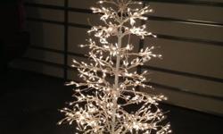 We have a white 5 foot lighted white wire tree, all lights work, $15, see pix. Also have a 7Ft Lighted Tree that has 4 sets of lights, 1 does not work, other than that it;s in good condition. Call --