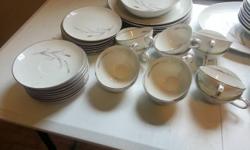 64 piece set coreling china...white w/platinum wheat pattern....excellent condition, no chips
