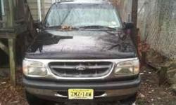 i got 4 sale a 98 ford explorer xlt in perfect running condition i recently did the brakes nd put a new engine nd tranny in it has around 100k miles very reliable truck but i am moving so need to get rid of if interested call 862 452 4726