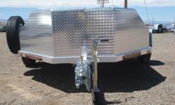 This Aluma Trailers MC210 Aluminum Motorcycle Trailer has a GVWR of 2,990 Lbs, a Payload Capacity of 2,550 Lbs, it is 7Ft wide by 13Ft Long, has Rubber Torsion Axles Suspension, 8 Tie Down Rings, 13Inch Aluminum Wheels with Customer Care Club Membership