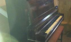 Antique Piano somewhere between 1890-1920 in wonderful shape The story how I came into possession of the piano: Im a contractor in Morristown that had recently remodeled a turn of the century historic building in downtown Morristown. The new building's
