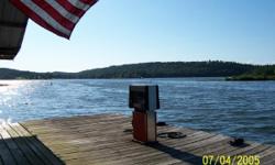 Great recreational property on beautiful 39,000 acre Lake, known for its great fishing tournaments and recreational facilities. Fantastic views of surrounding mountains. This is a 46 slip Marina with floating store, gas pump, boat repair/storage bldg and
