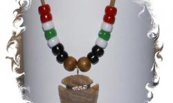 Necklace is made by hand has beads, arrowhead and is made adjustable. Made in many different colors. Go to shop.wyldboreracing.net with Free Shipping. Don't let this pass you by! Check us out and buy!