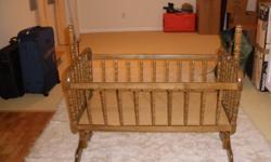 Genuine wood baby crib.