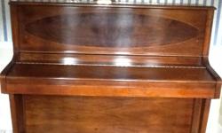 Beautiful Baldwin Upright Piano with inlay.&nbsp; Excellent condition, original owners. Moving to California and need to sell.