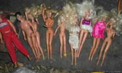 1980's, I'm guessing about 40 of them
3 Ken dolls too
2&nbsp;bigger type&nbsp;old dolls and a baby doll
$100.00 for&nbsp;the barbies and the dolls
the barbies come with a bunch of plastic house type stuff and such&nbsp;