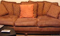 Brown couch, No tears, No stains, No flaws, Nearly New.
Maroon is mixed in the brown on the pillows, with beautiful design.
You pick up, we only have a car. Will not pay to be shipped anywhere. Live about 15 minutes from Little Rock.
MUST GO. Need more
