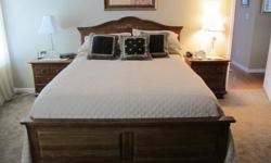 Solid wood bedroom suit, triple dresser, highboy, 2 nightstands, headboard and footboard. Everything in great condition. Drawers in highboy do not pull straight out.