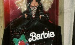 Happy Holiday Barbie 1991,&nbsp;never opened, mint condition, for&nbsp;collectors.&nbsp; Asking $100.