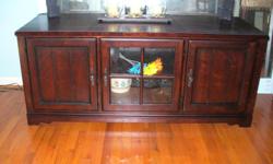 This is Broyhill's Attic Heirlooms Collection, entertainment center 60" with 3 panel doors and 2 shelves with a pullout DVD storage rack.&nbsp; In Excellent Condition. End table is 23"Wx27"Dx24.5"H with one pullout drawer.
&nbsp;