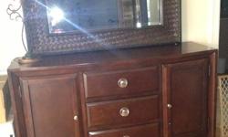Dark brown...solid wood...Three fitted drawers...top drawer lined for silverware...
Serious inquiries ask for exact dimensions. About 36" high-19" deep-55" width
Mirror is NOT included...selling it separately for $75
I only deal with people who will view
