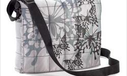 Item #: 38498 | Brand: NULL | Model No.: NULL
Weight: N/A | UPC:
Capture the season's hottest looks - plush quilting and bold graphic butterfly print - with this ultra-cool shoulder bag! Sure to be the envy of any fashion diva, this marvelous pewter-toned