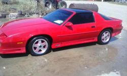1991 Red camaro rs low miles runs great for sale or trade for a 4/4 truck chevy if possible or a ford depends on the truck