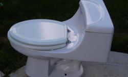 Western One Piece Ceramic Toilet. 1.8 gpf (gallons per flush). Clean and works.