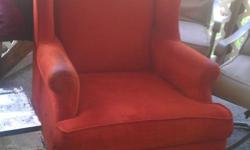 burnt orange high back chair a little wear on&nbsp; the arm rests. other than that good condition.