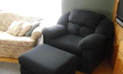 Like-new, overstuffed chair and half with matching ottoman.
Dark teal color
Too large for my room