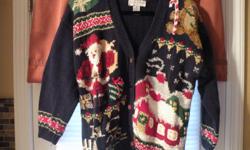 THREE (UGLY )CHRSITMAS SWEATERS.&nbsp;&nbsp; SIZE M&nbsp; EXCELLENT CONDITION&nbsp; 1 BLACK BACKGROUND, 1 NAVY BACKGROUND 1 LIGHT BLUE