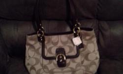 Brand new never been used very cute coach hand bag