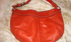 Burnt Orange, excellent condition leather genuine Coach purse.
