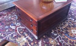 Stanley coffee table with 4 drawers. 2 on each side. One large and 1 smaller. Measures 41wx31dx20h. Excellent condition. Original price was $800. Moving must sell