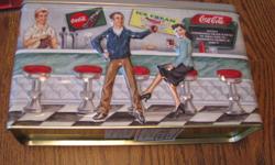 Various Coca Cola collectibles (ALL NEW): a tin depicting an ice cream parlor; a night light; a magnet; 2 sets of playing cards; a drive to the beach matchbox car.
Must buy entire lot! Contact Jill at 931-503-2222